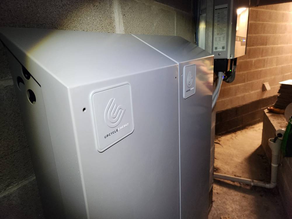 A 20 kWh battery cabinet installed under a house