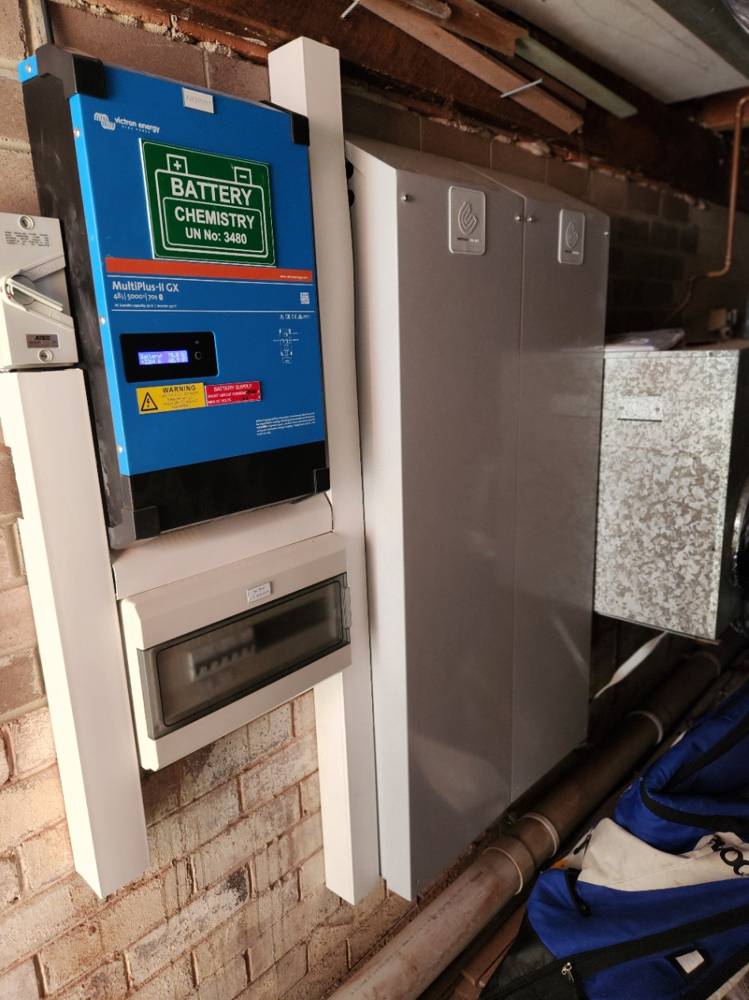 A 20 kWh installation with an inverter, distribution board and dangerous goods labelling