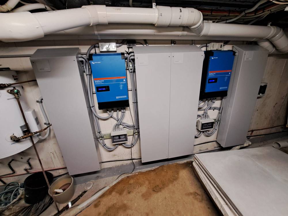 A 40 kWh installation of battery cabinets and two inverters in a basement