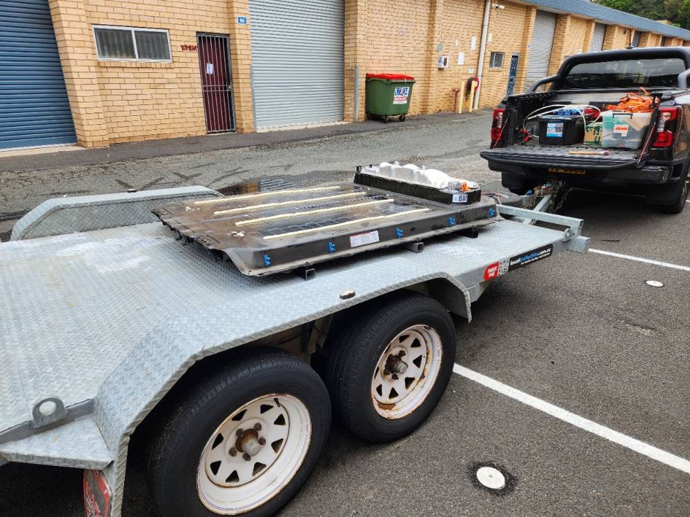A battery pack loaded on a trailer for transport to an industrial site